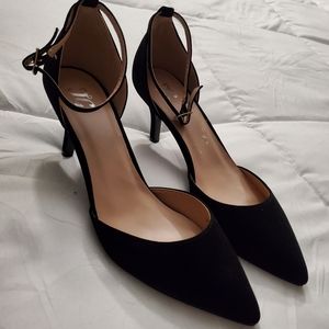 Pointed black suede high heels